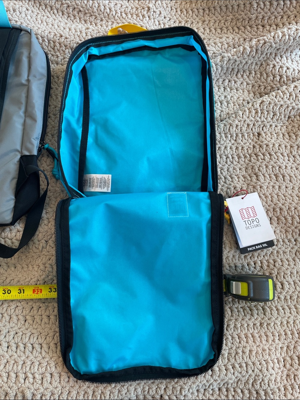 Topo Designs Gray & Black
CARVANA Travel and Daily bag with Turquoise Accents - Picture 11 of 13